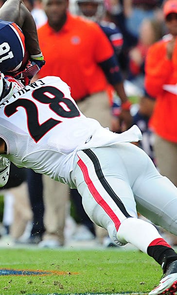 Four Georgia players arrested, charged with illegal check-cashing